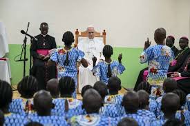Pope Léo XIV urges Cameroon government to invest in youths, for peace. pope and orphans